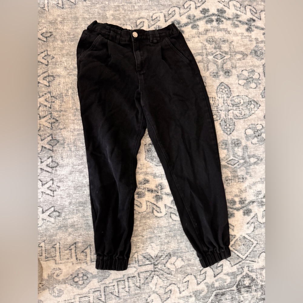 Black worn denim joggers